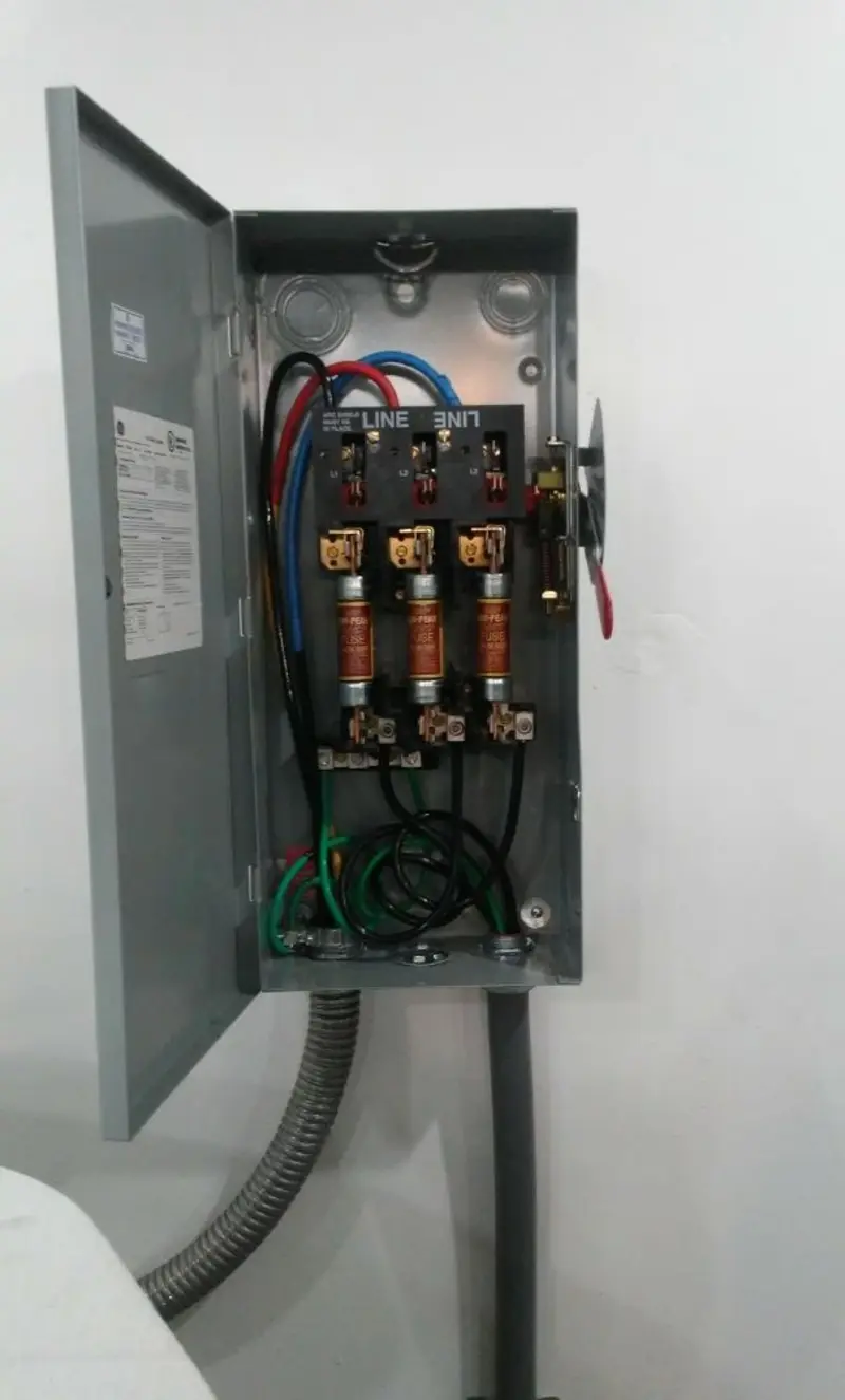 Three-phase disconnect switch installed for Smoke Detector Installation in South Daytona